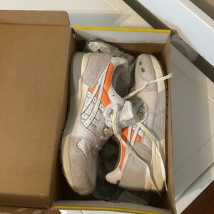 Asics White and Orange Sneakers with Signature Stripes